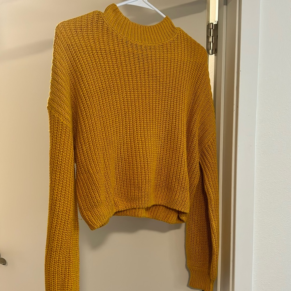 cropped knitted yellow turtleneck sweater